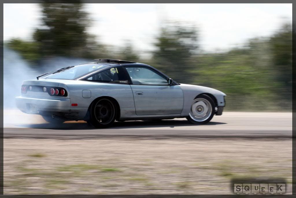 IMAGE: http://i258.photobucket.com/albums/hh250/jdm_squeek/dRIFT/IMG_4077copy.jpg