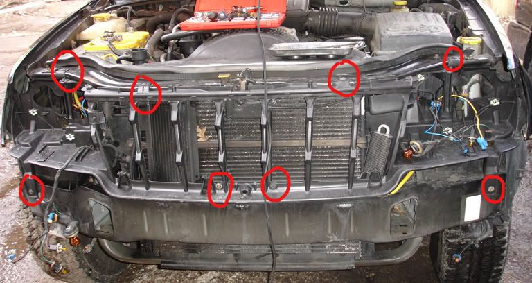 Remove 2005 jeep grand cherokee headlight assembly #4
